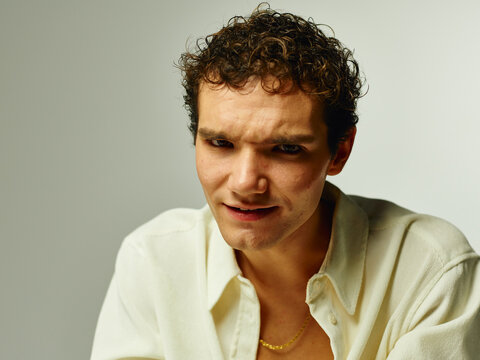 Interesting man in white shirt