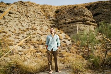 Man posing outdoors in the nature.