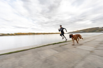 Outdoor run of woman and her dog