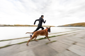Outdoor run of woman and her dog
