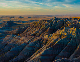 Sunrise Over The White River Valley and The Eroded Cliffs of Panorama Point, Badlands National...