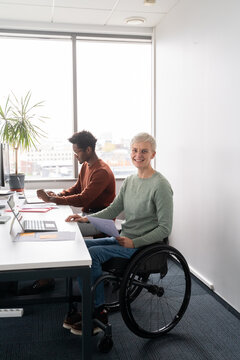 Smiling Woman In The Wheelchair Portrait At Office 