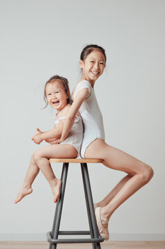 Portrait of cute girls in leotard