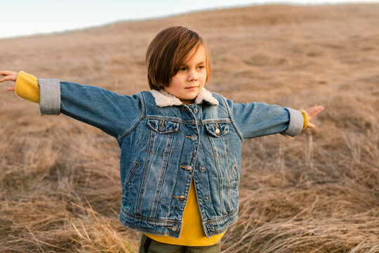 Boy enjoying by the field