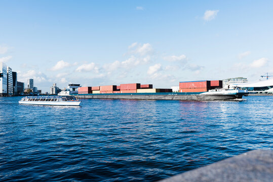 A Cargo ship on the river in city