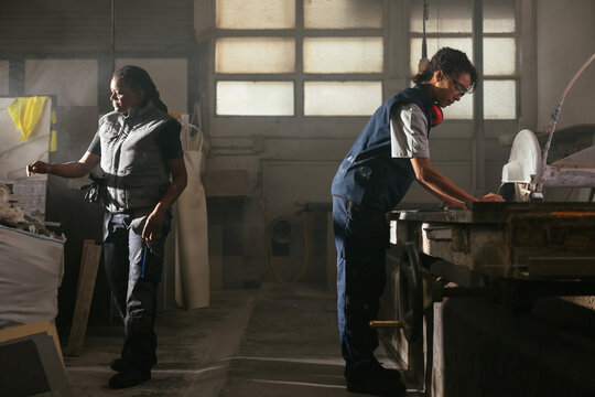 Diverse female colleagues working on marble industry