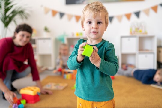 toddler boy looking at camera