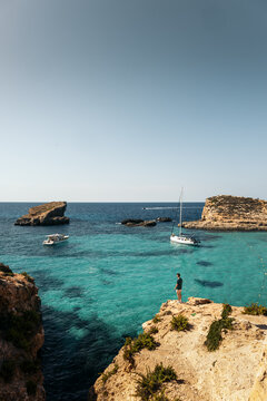 Man visiting the Blue Lagoon in Malta