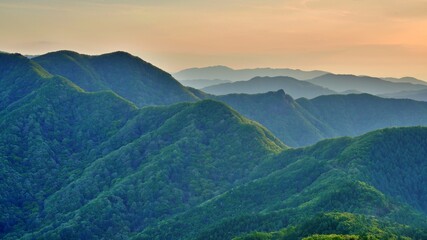 Fototapeta premium View of the surrounding mountains from the Hadong gliding field in South Korea