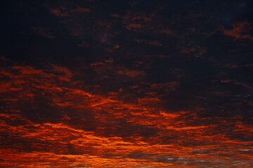 Colorful embossed clouds in the dawn sky