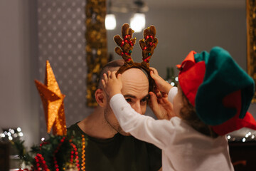 Family celebrate Christmas at home
