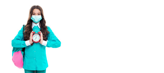 cheerful girl hold clock at studio. school quarantine and biorhythm. photo of girl on quarantine