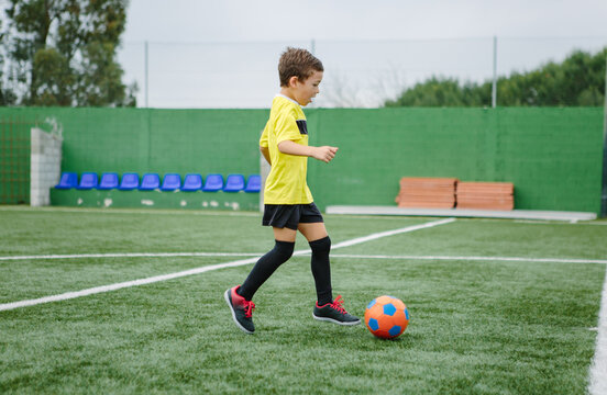 Learning to dribble, soccer.