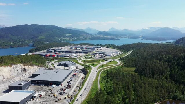 Digernes industrial area is beautifully located in the middle of the forest and fjords. Just outside &Aring;lesund on Sunnm&oslash;re in Norway. In the background we see the center of Skodje, and the Sunnm&oslash;re Alps