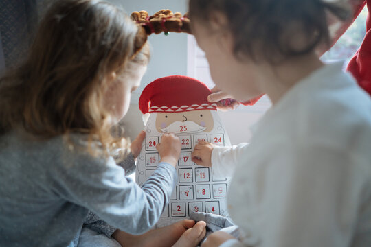 Children with Christmas advent calendar