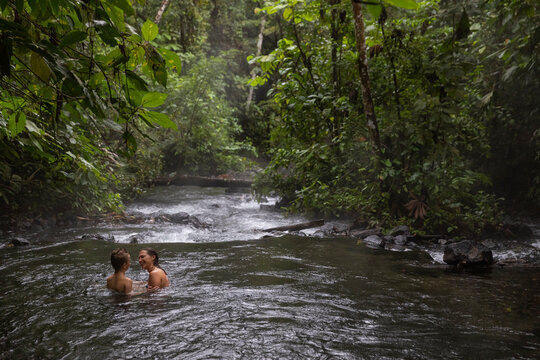 Family laugh together travel in Costa Rica mother and son adventure 