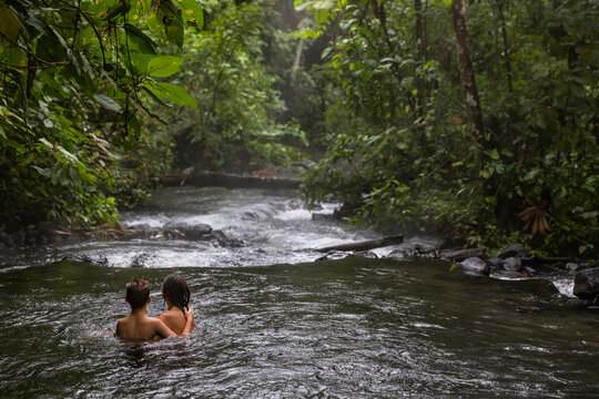 Travel Landscape in Costa Rica mother and son adventure in hot spring