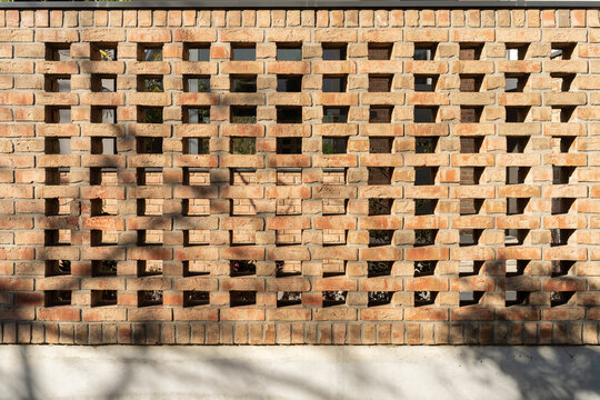 Fototapeta Industrial background, empty grunge urban street with brick wall