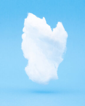 White cotton cloud float in a blue paper sky