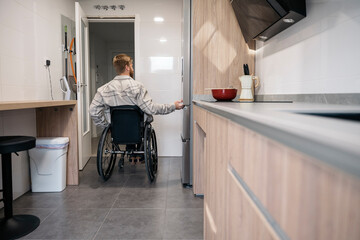 Handicap Man Opening Fridge
