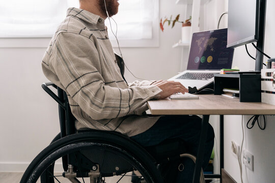 Handicap Man Working in Home Office
