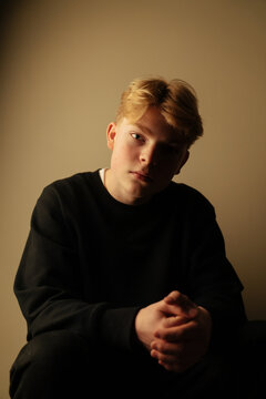 Emotional portrait of a blonde teenager.