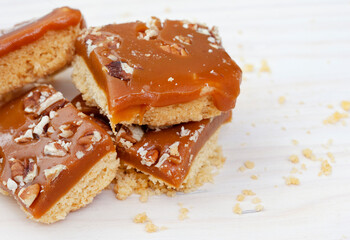  Decadent shortbread squares with salted caramel and pecan nut topping