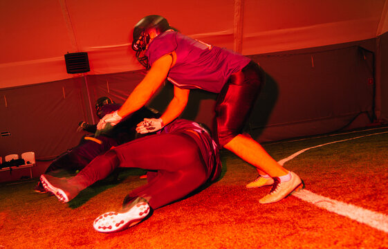 american football players in action