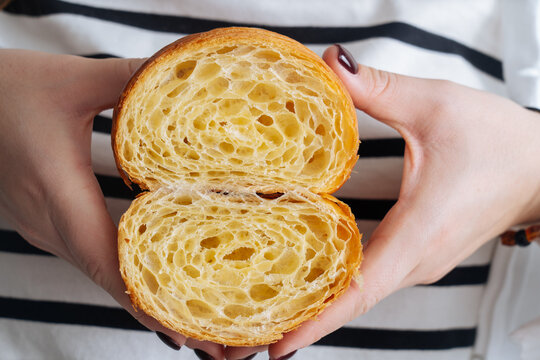 Fresh croissant cut in halves