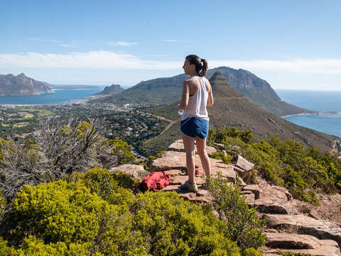 Hiker resting on the sumit