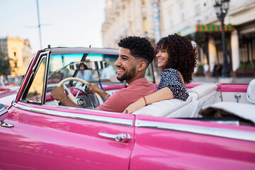 Man driving girlfriend in car on date