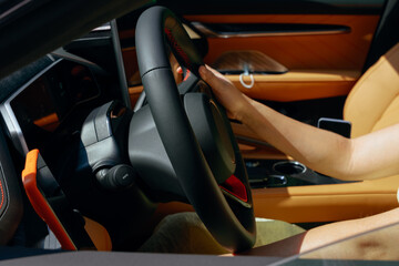 woman in modern electric car