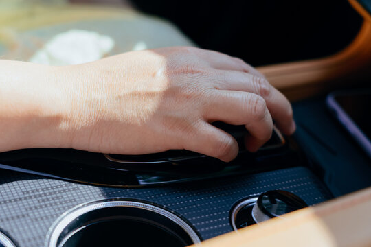 operating gear lever in modern electric car