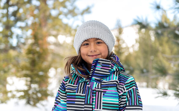 Cute little girl in her snow outfit