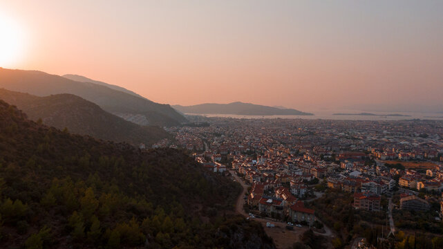 drone View Of a town by the Mountain chain
