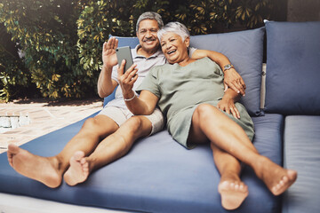 Obraz premium Senior couple, relax and smile for video call, social media or selfie together on outdoor patio at home. Happy elderly man and woman relaxing on comfortable cushion for online chat or communication