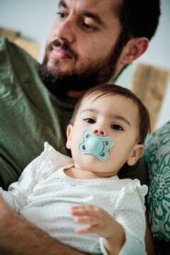Man relaxing with his daughter.