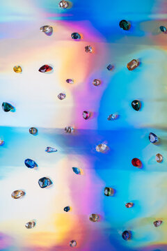 Scattered multicolored crystals.