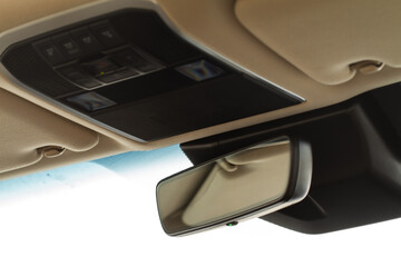 Rear view mirror closeup in nodern car. Car rear view mirror inside the car.