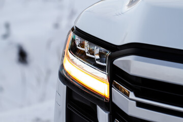 Modern car turn signal. Car turn signal close up. Close up of the modern turn signal.
