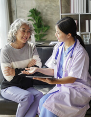  consulting female patient about pills and discussing health treatment sitting in the office at the desk. Medicine and health care concept. Doctor prescribing medicine to patient in the office.