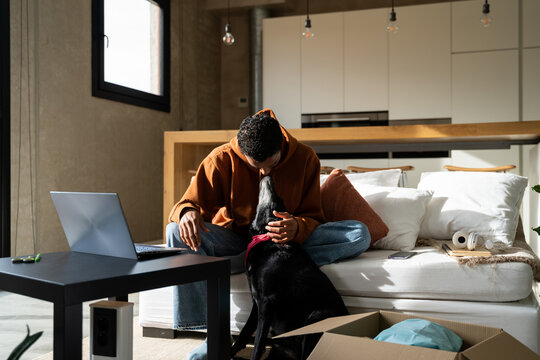 Man with dog at home