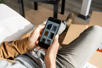 Man shopping online on phone app