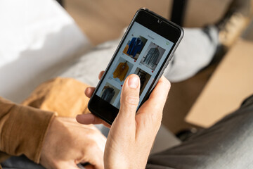 Man shopping online on phone app