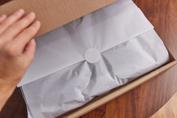 Opening a wrapped gift