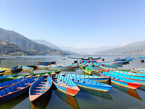Boats on Phewa Lake in Pokhara, Nepal