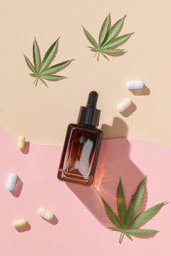 Various glass bottles with CBD oil, THC tincture, capsule