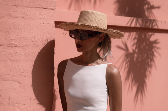 Woman in Straw Hat - Powered by Adobe