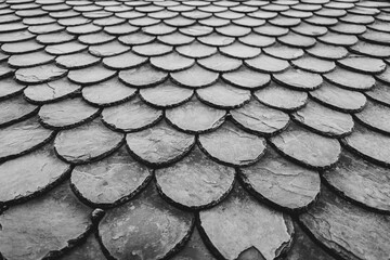 Slate tiles make a roof, and a pattern