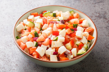 Conch salad native dish of the Bahamas closeup on the plate on the table. Horizontal